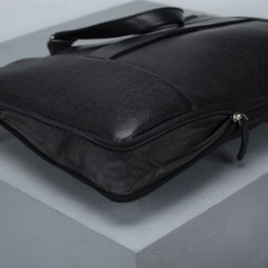 کیف مردانه چرم اصل و طبیعی مشکی الگانت فوق باریک با بند دوشی و دستی بهمراه ساک دستی نمای تغییر سایز برند چرم حقی