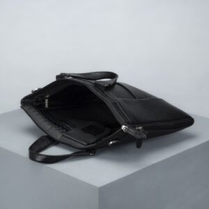 کیف مردانه چرم اصل و طبیعی مشکی الگانت فوق باریک با بند دوشی و دستی بهمراه ساک دستی نمای داخل کیف برند چرم حقی