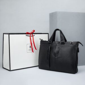 کیف مردانه چرم اصل و طبیعی مشکی فوق باریک با بند دوشی و دستی بهمراه ساک دستی برند چرم حقی